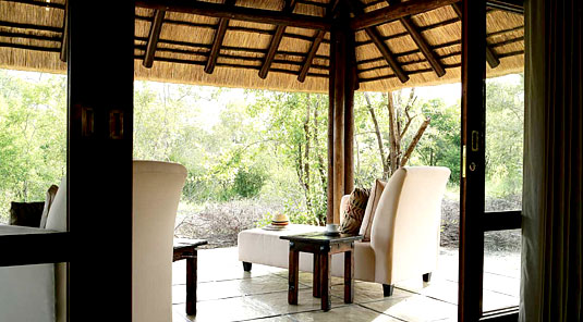 Relax on your private patio in your Luxury Room at Arathusa Safari Lodge in the Sabi Sands Game Reserve, South Africa