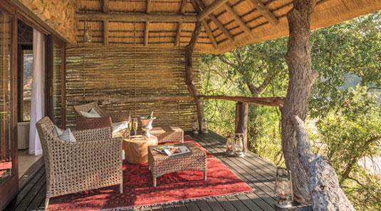 Luxury suite private deck lounge at Dulini Safari Lodge located in the Big Five Sabi Sand Game Reserve, South Africa