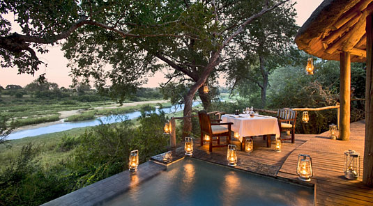 Suite's private deck and plunge pool with view of the river at Dulini River Lodge located in the Big 5 Sabi Sand Private Game Reserve