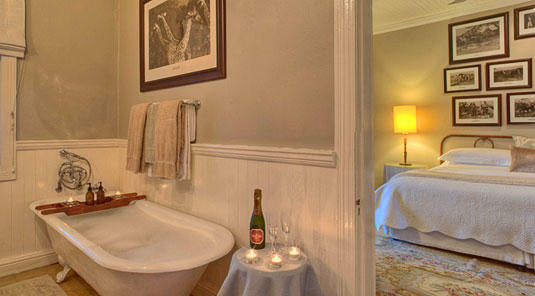 Luxury Suite's bathroom at Kirkman's Kamp located in the Sabi Sand Private Game Reserve