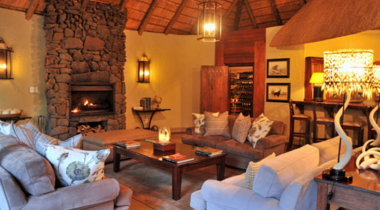 Main Lodge Lounge Fireplace Luxury Accommodation Savanna Private Game Reserve Sabi Sands Reserve Accommodation bookings